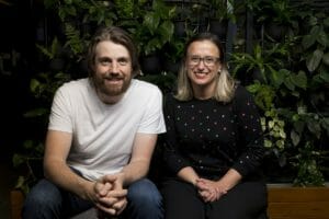 Katherine McConnell and Mike Cannon Brookes sat together in 2017